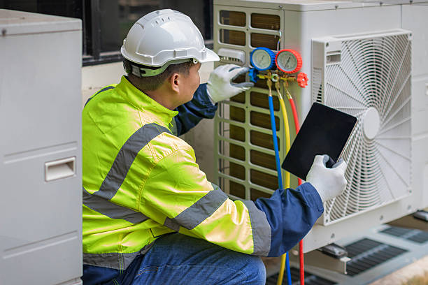 Professional Emergency Hvac technician working in Pluckemin, NJ